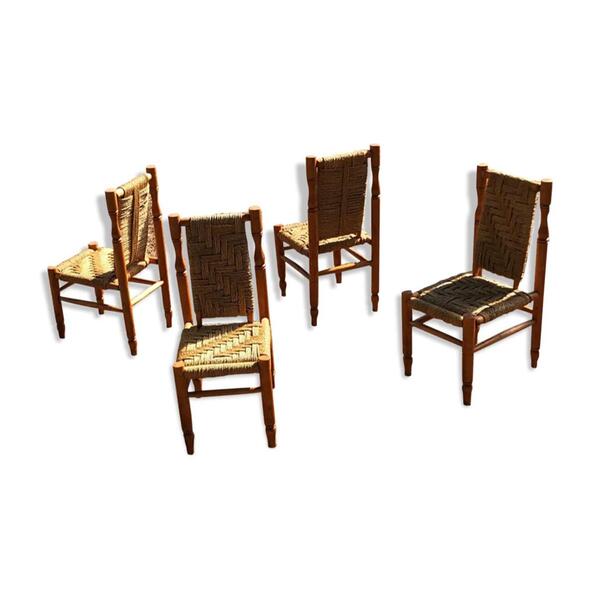 Suite de 4 grandes chaises en bois et paillage . Vers 1960